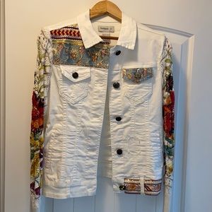 Desigual white jean jacket with sweater arms.